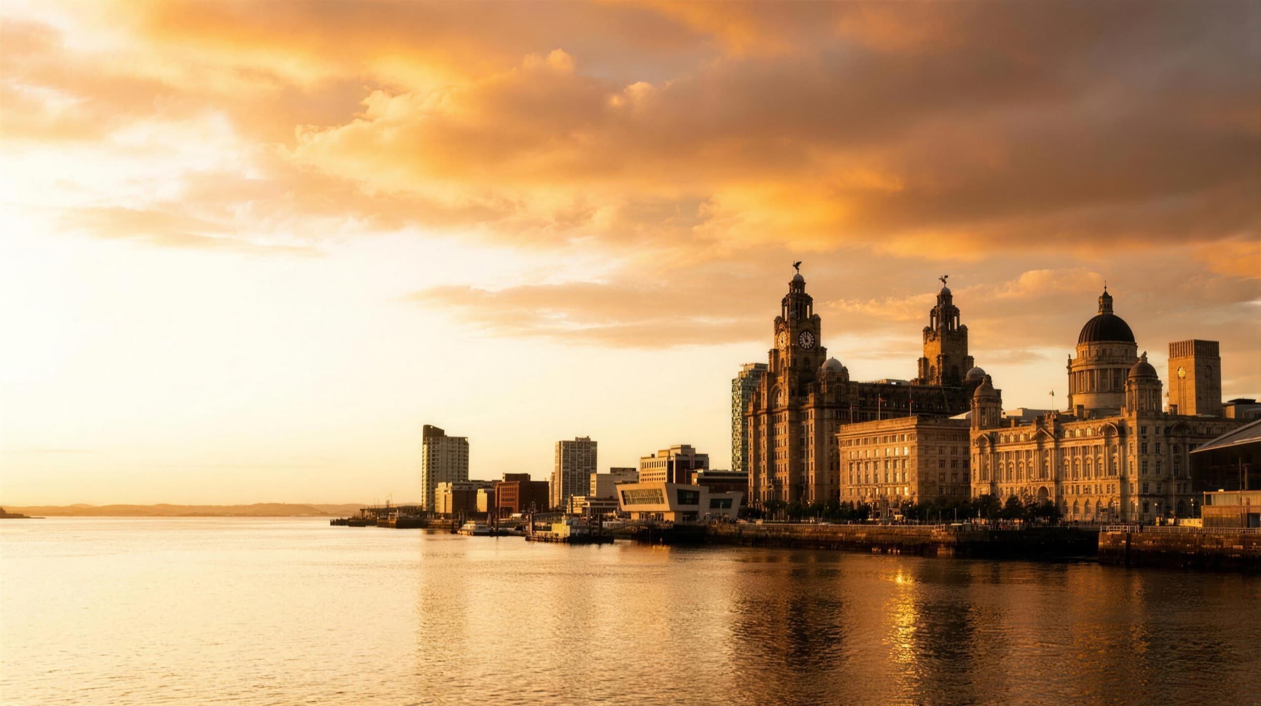 The Liverpool waterfront and Royal Liver Building at golden hour